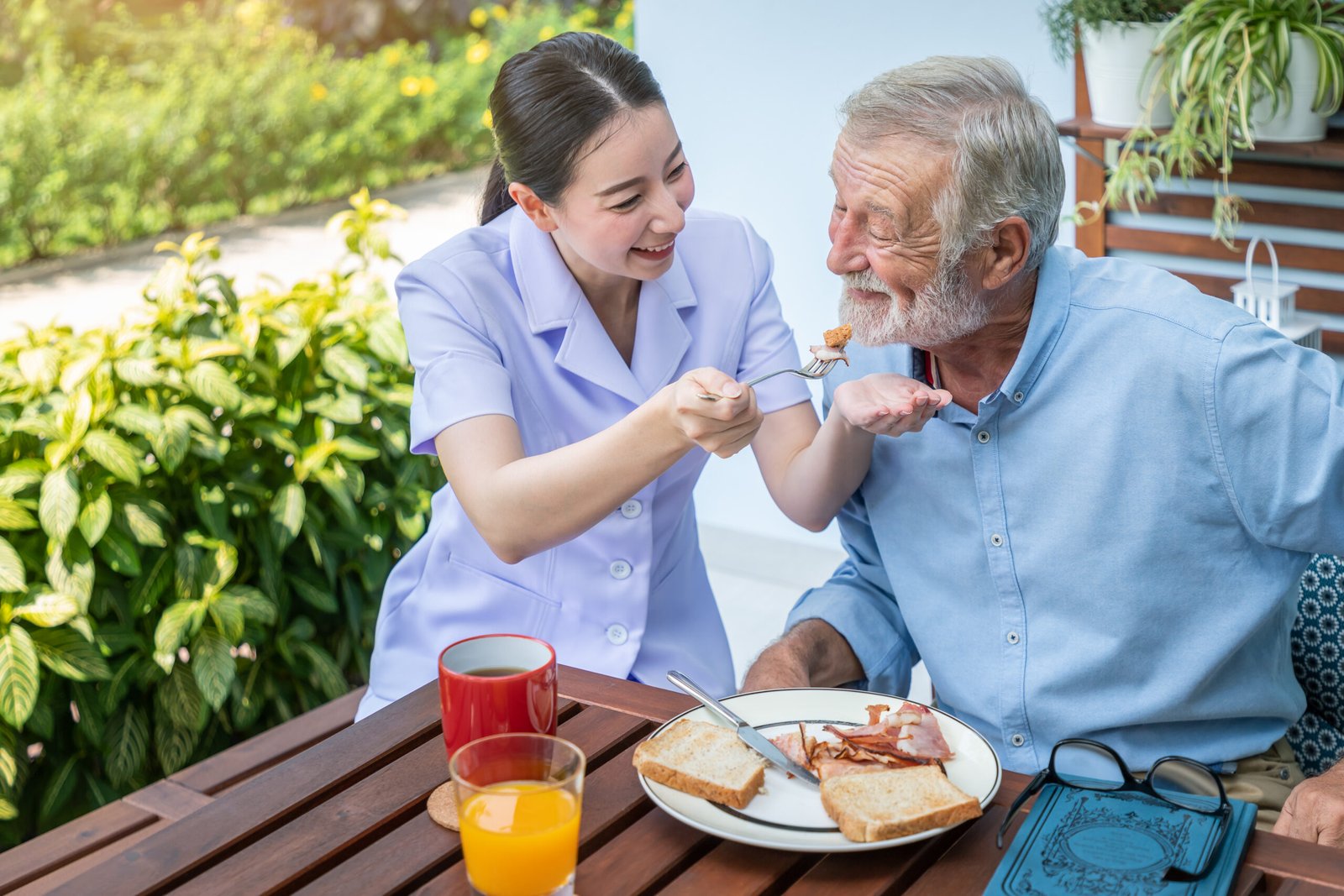 Nurse caring for resident